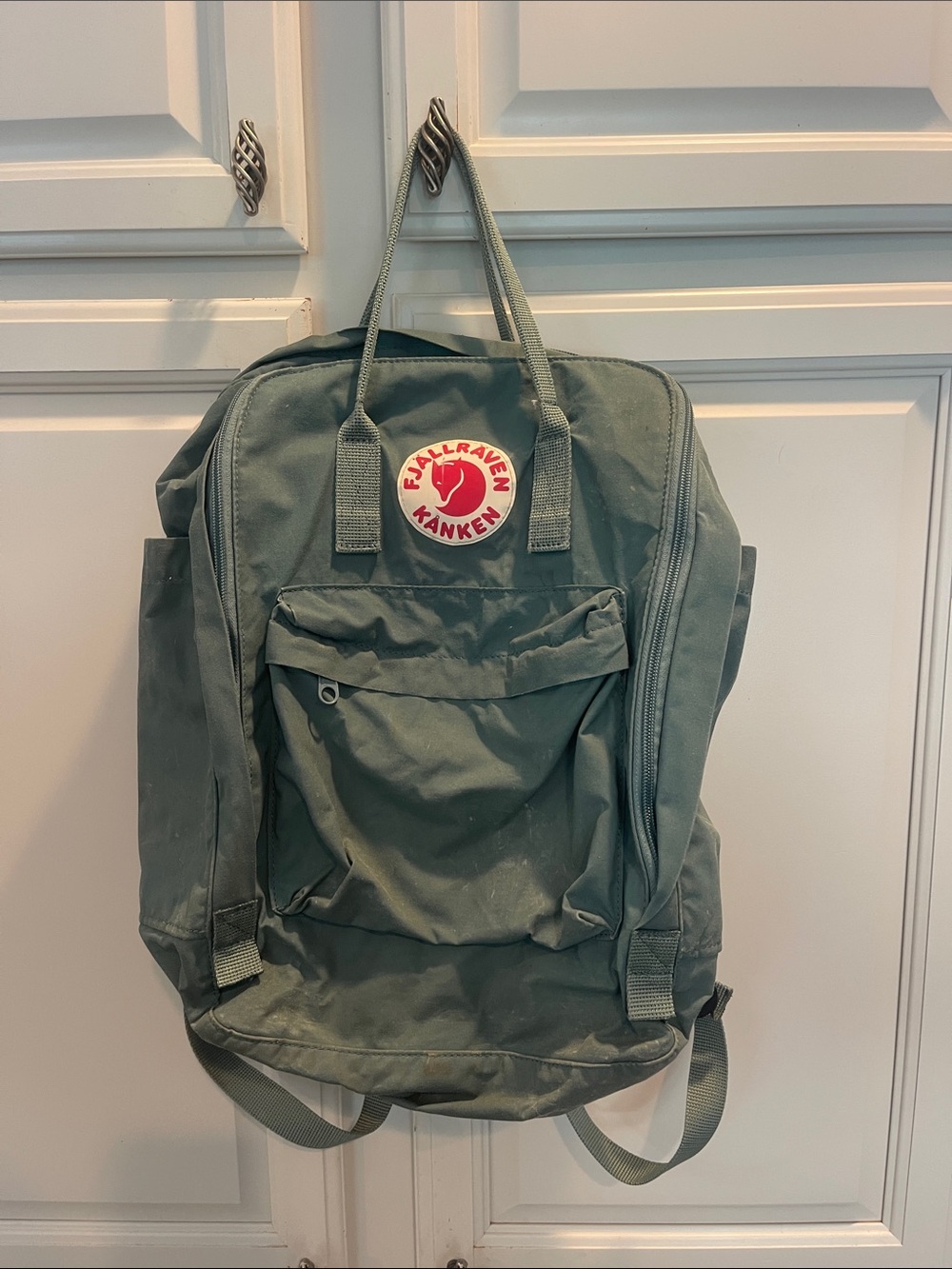 Fjallraven Kånken Backpack in Olive Green with Red Logo